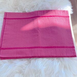 Set of four pink placemats with pink ribbon